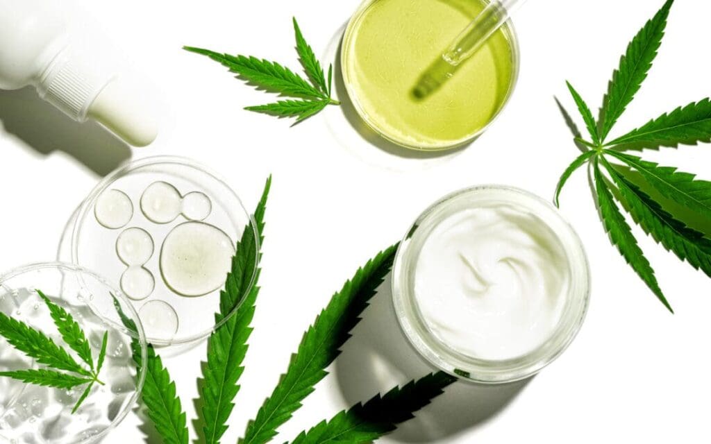 CBD gummy production line with workers packaging wellness products.